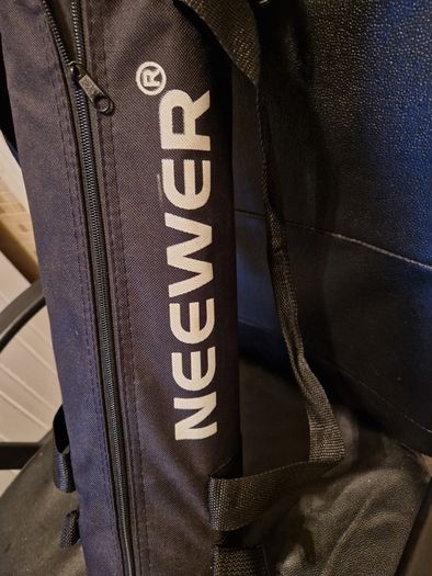 NEEWER, 2 Photography Tripods and feet and also 5ft circular Silver Light enhancer all in new condition and in lovely cases