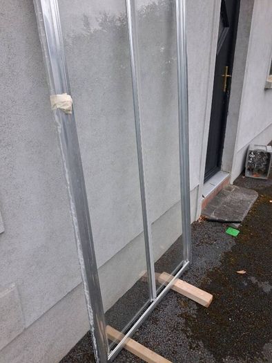 Bifold shower door