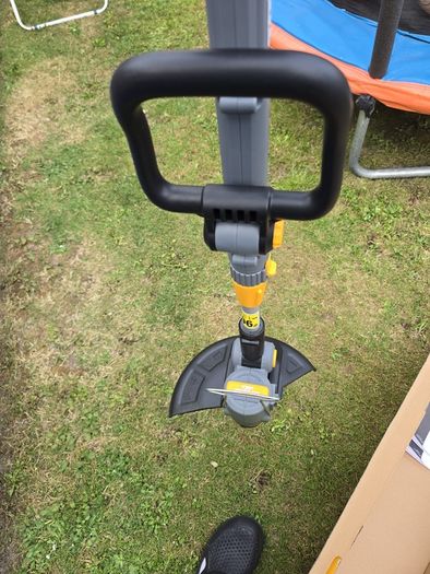 Titan grass strimmer.