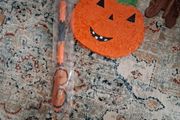 Halloween Pinata with stick and mask.