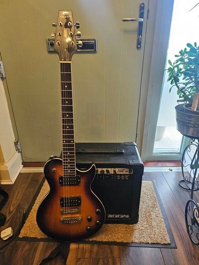 Aria electric guitar with Zoom Fire-15 Amp