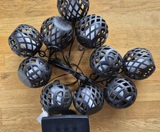 Globe style candle effect solar lights.