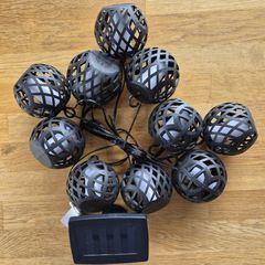 Globe style candle effect solar lights.