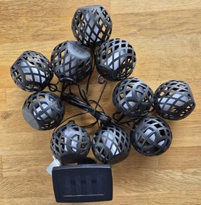 Globe style candle effect solar lights.