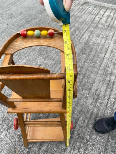 Vintage wooden doll high chair FROM THE 1930S featuring a built-in play tray with a wire bead