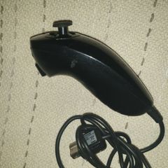 One Black numchuck Controller For Sale Here