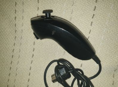 One Black numchuck Controller For Sale Here