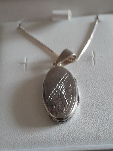 silver chain and locket