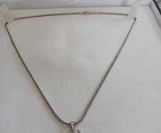 silver chain and pendant