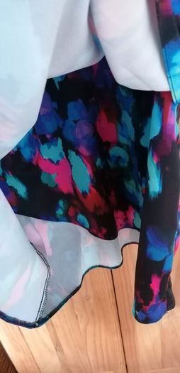 dress gallery size 14 elasticated waist at back. Wrap style  that doesnt open
