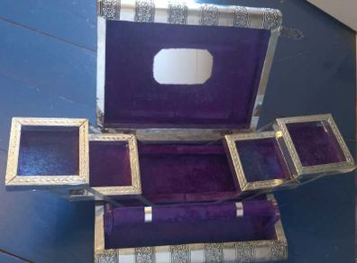 Book-shaped silver jewellery box with purple velvet lining