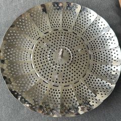 This is a collapsible stainless steel steamer basket