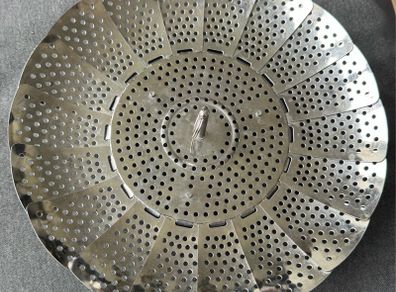 This is a collapsible stainless steel steamer basket