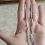 Silver tone chain earrings. Image 3
