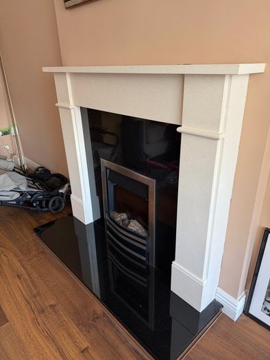 granite fireplace with electric fire