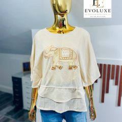 stunning elephant embroidery to the lightweight, textured drape and split-sleeve design this top is a wardrobe must-have.