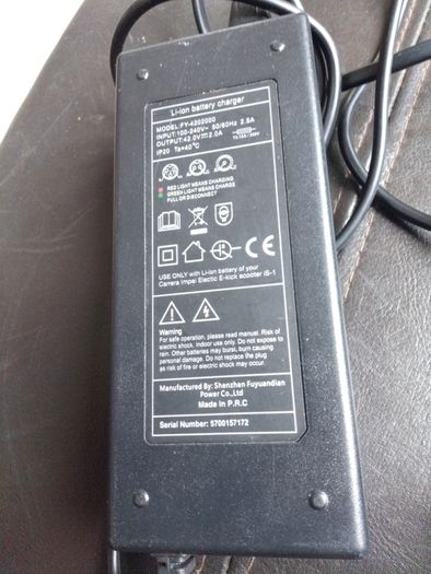 Carerra impel e-scooter charger wanted