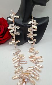 14 ct  pink Biwa stick and baroque freshwater pearl statement necklace.