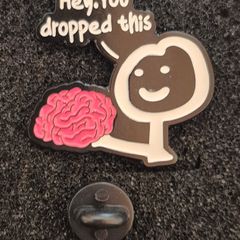 Hey, you dropped this. ,  pin back badge.