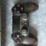 Sony PlayStation 4 Console with 2 Controllers and Charging Dock Image 4