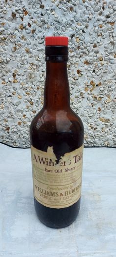 vintage bottle of winters tale sherry 3/4 full ,found in a old pub closed down,