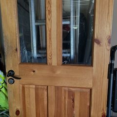 solid wooden doors with glass