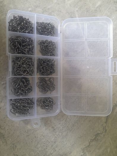 2 Boxes of small fishing hooks