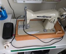 Vintage cased Sovereign electric sewing machine