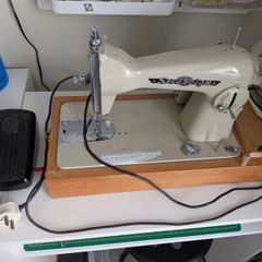 Vintage cased Sovereign electric sewing machine