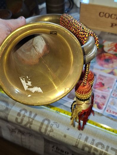 Antique Brass Military Bugle features a Distinctive Cap Badge