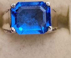 A Vintage Sterling Silver Gemstone Blue Emerald Cut Ring. Ring Size K Total Weight 5.86 Grams.