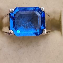 A Vintage Sterling Silver Gemstone Blue Emerald Cut Ring. Ring Size K Total Weight 5.86 Grams.