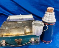 Antique thermos flask and lunch box