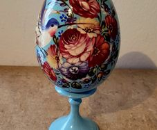 Vintage handpainted laquered egg on stand
