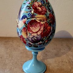 Vintage handpainted laquered egg on stand