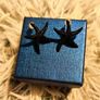 Small Shiny Earrings with Black Starfish Motif Elegant Minimal Style Image 8