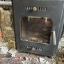 3 fireplaces and 1 stove Image 4