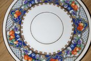 Small JLS early 20th Century Schneider &amp; Co.  fruit pattern saucer