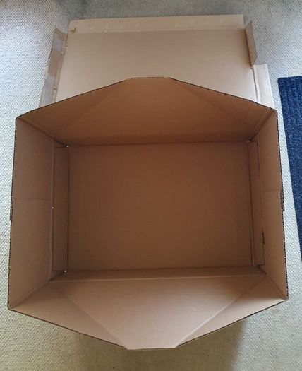 Large flat cardboard box for under bed storage