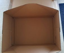Large flat cardboard box for under bed storage