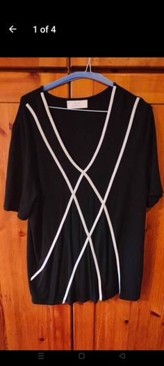 Ladies Ann Harvey black and white top.