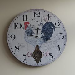 Vintage-style pendulum clock with rooster