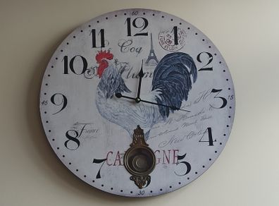 Vintage-style pendulum clock with rooster