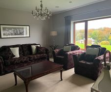 sofa and two chairs