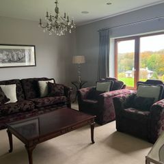 sofa and two chairs