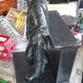 Large Cowboy Sculpture is titled Cutting the Dust and was created by artist Michael Garman. It is a Western Themed piece featuring a Cowboy Leaning Against a Counter, Image 10