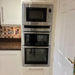 Kitchen including appliances