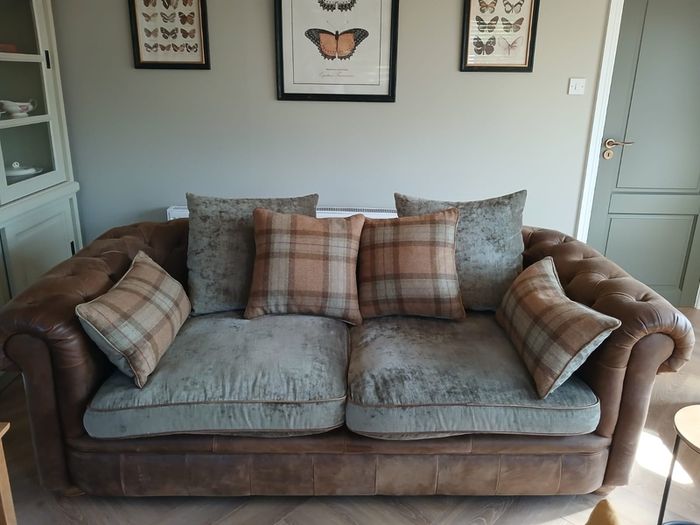 Chesterfield couch & 2 single chairs in brown leather and sage green cushions. Perfect condition,  non smokers, no house pets.  Couch Width 7ft, Depth 4ft. Chairs Width 3ft2ins, Depth 3ft