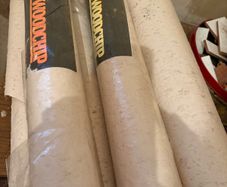 Free: Rolls of coarse wood chip wallpaper