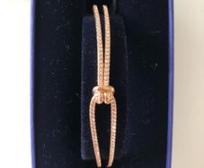 Brand New In Box Swarovski rose gold knot bangle/bracelet